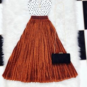 Pleated sparkly midi skirt. Champagne color. New, never worn.